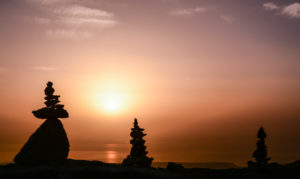 Stacks of stones in sunset